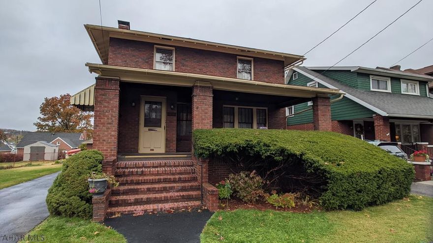 Check out the immersive 3D tour! Fantastic 2 story brick home in the heart of Hollidaysburg Borough! Just a few blocks from schools, YMCA, downtown and more! This is a large-sized home that includes a spacious living room with brick fireplace, formal dining room, eat-in kitchen with breakfast nook breakfast bar plus large enclosed back porch (w/ screens). Beautiful hardwood floors and staircase. There are 3 bedrooms and 1.5 baths upstairs with ample closets. The walkout basement includes a semi-finished room, 3/4 bath and large cedar closets for additional living space. Relaxing covered front porch. Oversized 2 detached garage is large enough to easily hold 3 cars or extra stall could be a nice workshop area. All new circuit breakers 2020.