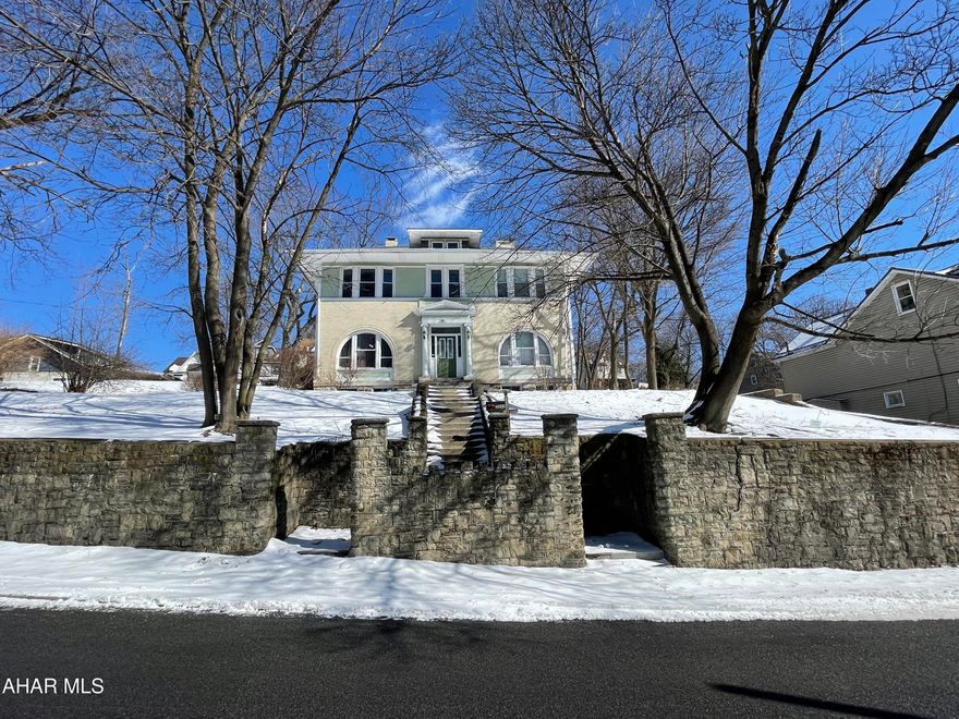 This unique property was once a 1900s mansion with massive rooms built in an era for entertaining. This impressive home was built to sit high in the neighborhood looking down on all the neighboring properties. Stunning curb appeal with the beautiful stone wall along 10th street and a grand entrance to the front door.  Inside you will find stately features such as pocket doors, hardwood floors and a stunning staircase.  There are two wood burning fireplaces and plenty of space for all your family in this one.  With so much space inside and out, this house will be the place to be for all the parties. Plenty of parking off of 9th Street. All potential buyers must be accompanied onto the property by an agent.  Security cameras are in use.
