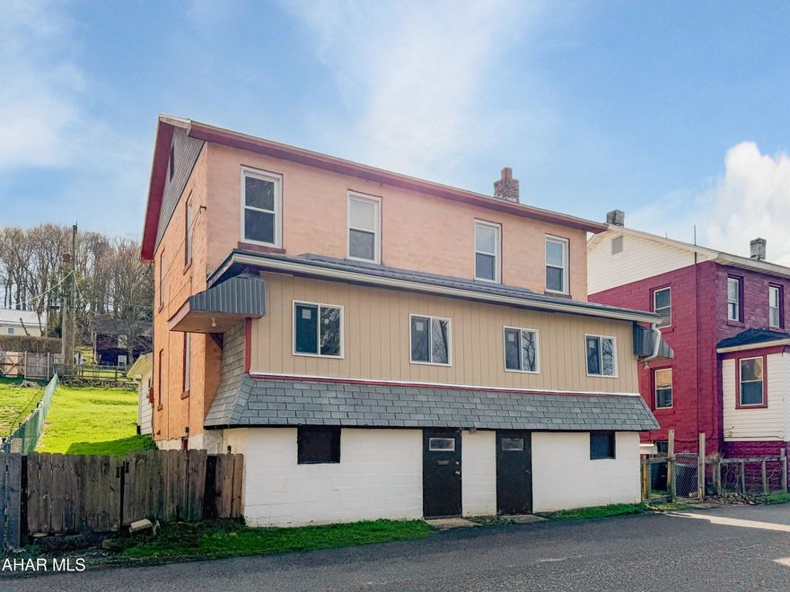 Welcome to 1635 Upper Christoff Street, located in the Blacklick Valley School District! Formerly a duplex, this home has been thoughtfully converted into a spacious single-family residence offering plenty of room. The main level features a generous living room, formal dining area, cozy family room, large eat-in kitchen, and a bright sun porch perfect for relaxing or entertaining. Upstairs, you'll find three spacious bedrooms along with a nicely updated full bathroom. The unfinished basement provides ample storage space and houses the home's mechanical systems. Outside, enjoy a large fenced-in yard and a covered, screened-in rear patio ideal for outdoor gatherings. Don't miss your opportunity to make this versatile and inviting home your own. Schedule your showing today!
