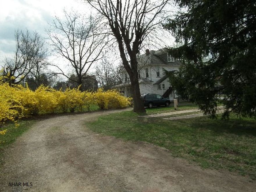 1.2 acre ground on high traffic 36/Logan Blvd. 200 ft. footage commercial - Back side to Lotz Ave. residental - Duplex included in sale with tenants.