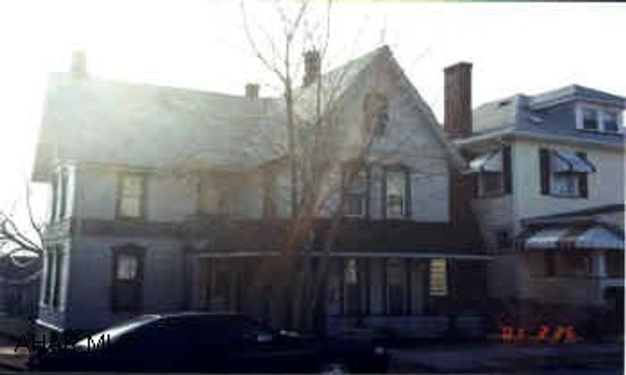 Super Duplex.  Previous owner occupied.  Top unit can be 3 bedroom.  Seperate heat and electric.