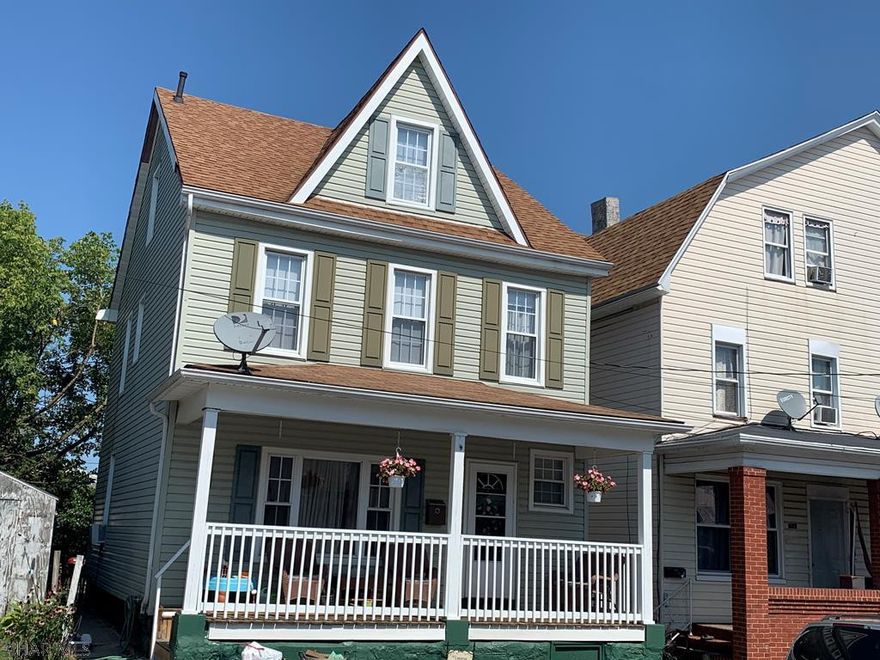 Completely renovated and move-in-ready home featuring an updated kitchen and bath, fenced-in yard and newer roof & furnace.