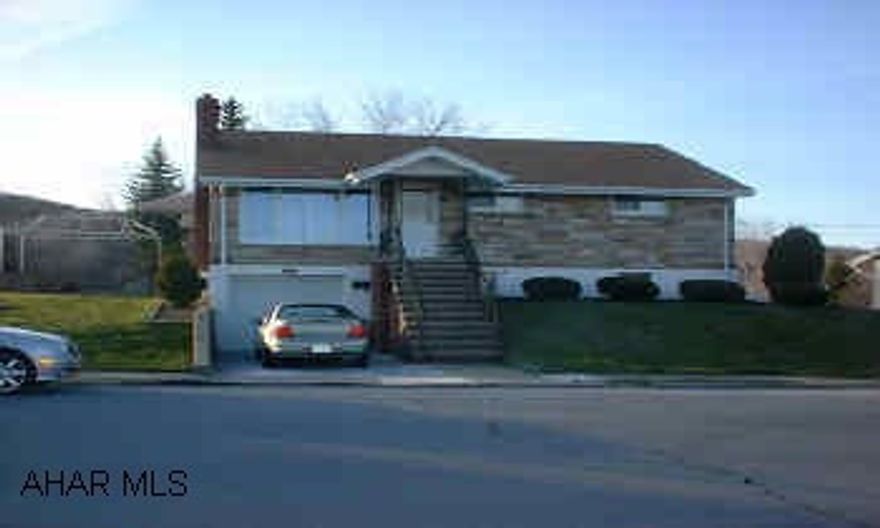 BRICK RANCH HAS 3 BEDROOMS, 1 CAR GARAGE, FIREPLACE, HARDWOOD FLOORS.  PARTIALLY FINISHED BASEMENT WITH 3/4 BATH AND KITCHEN, REPLACEMENT WINDOWS.