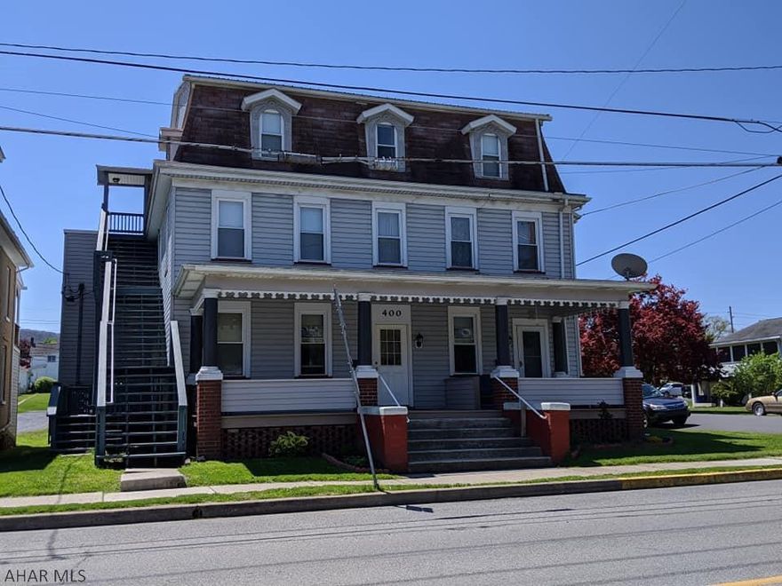 Don't miss out on this great investment property located in historical downtown Bedford.  This well maintained property features 6 rental apartments and 10 storage rental garages.  The apartments have been updated and the building is in great condition including a newer roof, siding, porches.  This property has great rental history and income.