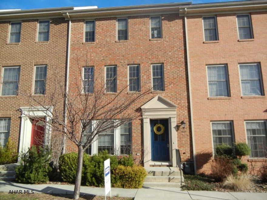 Sweet Cherry Court Townhouse.  New deck, hardwood floors, yard is fenced, and off street parking.  Lower level can be finished as you wish.