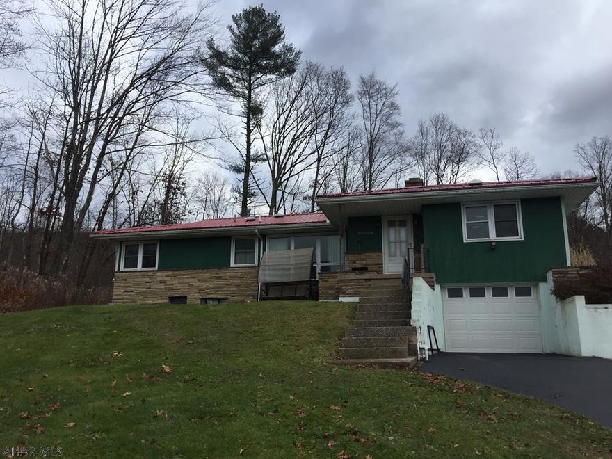 Location, location, location!  Easy access to shopping and attractions.  Well-loved rancher is waiting for a new family.  Hardwood floors under living room and bedroom carpets, granite kitchen countertops, recently remodeled full bath, and TONS of extra storage space.  Call today for your private showing!