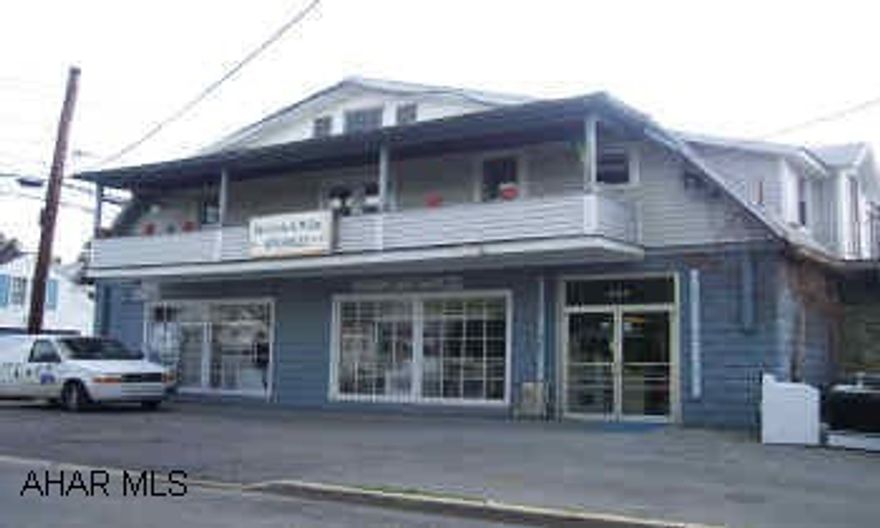 4 unit apartment with large commercial space Great income producing all currently rented