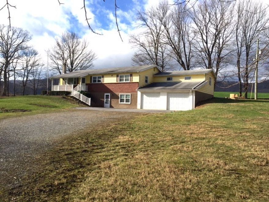 Country Living! Surrounded by farmland and views of the mountian. Very close to Iron Masters Golf Course. 3 Bedroom, 1 bath, 2 car garage on 2.02 acres. Basement could be finished into a family room. This home is located on a dead end road, very peaceful and private. Lots of possibilities!!! You will love the location!!!