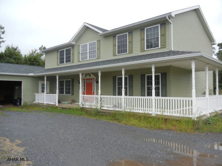 Newer two story on large, cleared lot.  Needs some TLC particularly interior, and garage doors. Basement is unfinished.