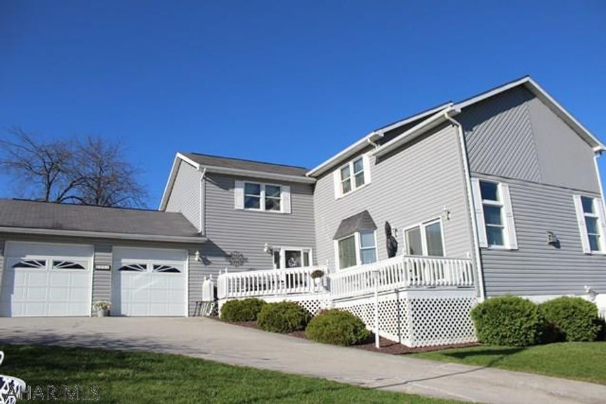 Large 4 bedroom 4 bathroom home that has been meticulously cared for.  This home has a floor to ceiling stone fireplace, hardwood flooring, updated kitchen, sun porch, partially finished basement and the list could go on! This home is not your cookie cutter style home and is a must see! Call today to set up a showing.