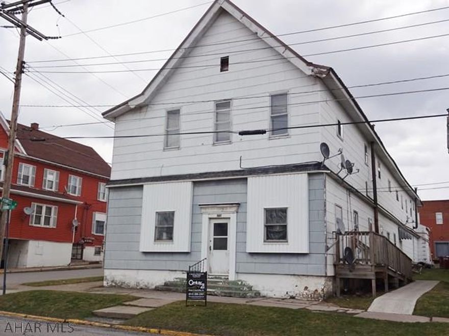 6 unit apartment building. Great location with in walking distance to business district & Mt. Aloysius College. Utilities are separate by unit. There is a 30x30 shop area which can be used for maintenance or additional rental space. Great investment opportunity. Metal roof installed in 10/2014. Pest control treatment 12-14-16