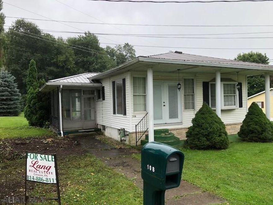 Come see this cozy ranch conveniently located 2 bedroom 1 bath home.  A spacious garage that can fit an RV or up to 4 cars. Lovely new ceiling fans. This unique home with an inviting kitchen,corner cabinet,and enclosed side porch is something to see and will not last.