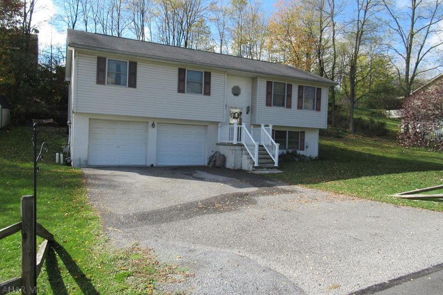 Seller is moving and very motivated for an offer! Come take a look at this Bi-level home nestled in quiet Maple Hollow Estates on a low traffic road with cul-de-sac! This home is priced to sell! 3 bedroom, 1.5 bathroom with a possible 4th bedroom in lower level along with utilities and half bathroom in unfinished bonus room area. 2 car garage with built in workbench ready for DIY projects. Nice rear patio that will be great for entertaining. Call today for a tour of this home to make it your own!