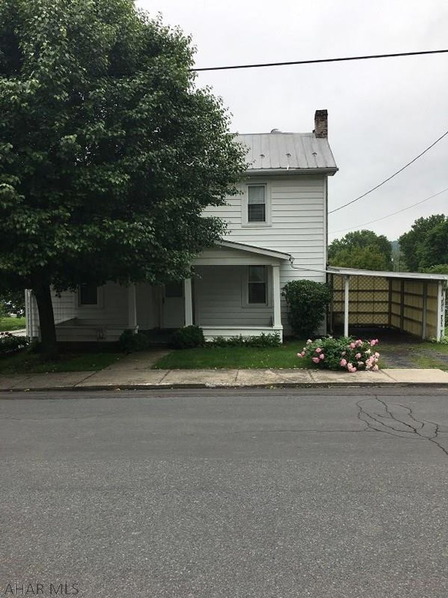 Nice property needing interior TLC. Nice flat double lot with vinyl privacy fence along the alley and hedges on street side. Shaded front porch as well as a small porch off of the kitchen.  Quiet residential neighborhood.