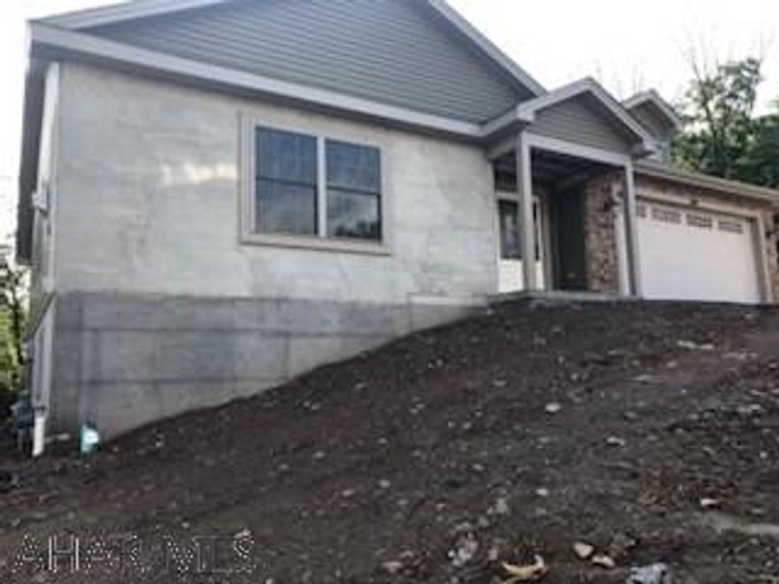 Newly constructed open concept home. 3 Bedroom, 2 full bath home with gas fireplace, main floor laundry.