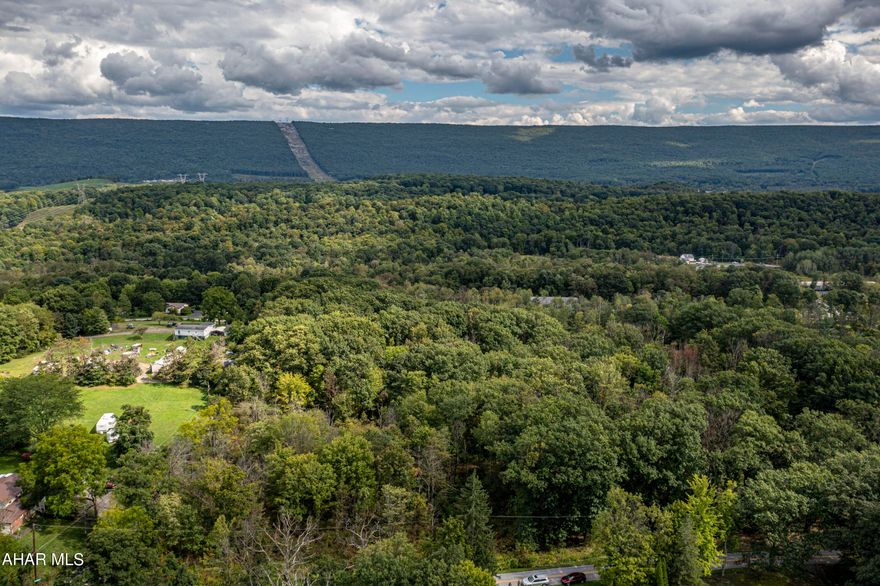 Great opportunity to purchase level building lot(s) in Bellwood-Antis School District. Two lots/2 acres each. Total of 4 acres. Can be purchased together or separate. Land is in Antis Twp. across from the Antis Cemetery - between Kerbaugh Rd. & Antis Rd. No zoning required.