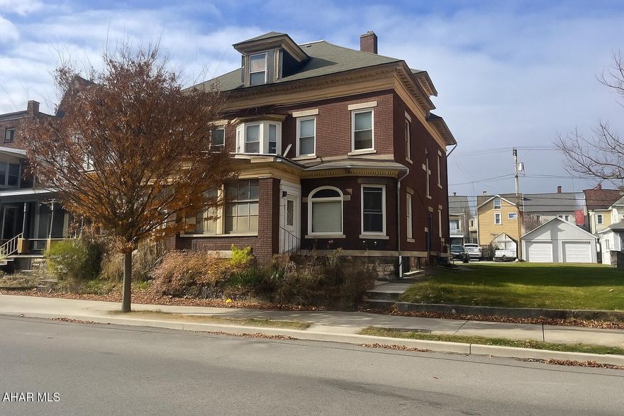 Fully rented Triplex!! 1st floor-one bedroom, 2nd floor- three bedroom, 3rd floor- two bedroom. Tenants pay utilities except gas. Gas is $206 average per month. Double lot and off street parking!