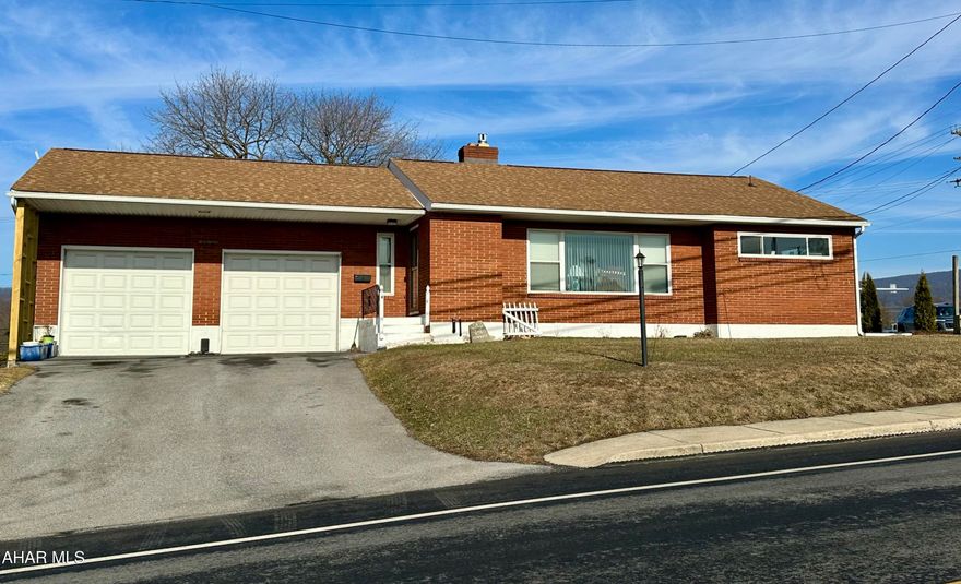 Location Location Location!!  Residential/Commercially zoned with  walking distance to amenities. The 3 bedroom brick ranch has been nicely maintained offering an oversized 12 ft garage doors for larger vehicle parking. The home features a beautiful, custom cherry cabinetry with quartz countertops, stainless steel appliances. The oak flooring is through out the home making it more spacious. The gas fireplace adds ambience to the living room making it cozy for relaxing on those cold winter nights.  The 3 bedrooms have higher windows making it easier for bedroom furniture to move around adding plenty of natural light and privacy! Double closets in bedrooms with a single closet give you  the option to have your washer/dryer on main floor. The bathroom has been updated with LED lighting and a lighted facet. Full basement with LED lighting. Private and spacious fenced in backyard, a 12x16 shed for storage and access to the alley for your convenience !!!  This is a MUST SEE!!!