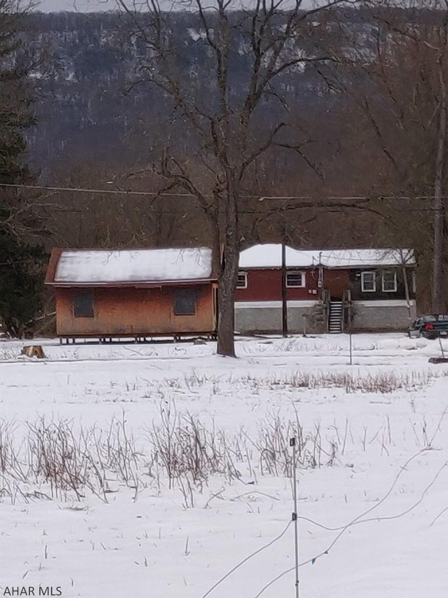 Excellent opportunity for a Homesteader, Outdoorsman, Handy Man, or Adventure Seeker. Great Location near the River. Raised Ranch with 2 BR, 1 Bath. Needs TLC but has real potential. Close to Hunting and Fishing and Canoe Creek. Country Living at its best in Hollidaysburg Area School District.