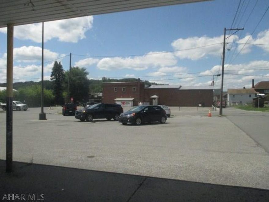 15,450 square foot 3 unit commercial building in Northern Cambria. 4,000 sq ft unit is currently occupied by Italian Village Pizza (with two five-year extensions). All utilities are separated. Also includes extra parking lot. Building for sale or lease.