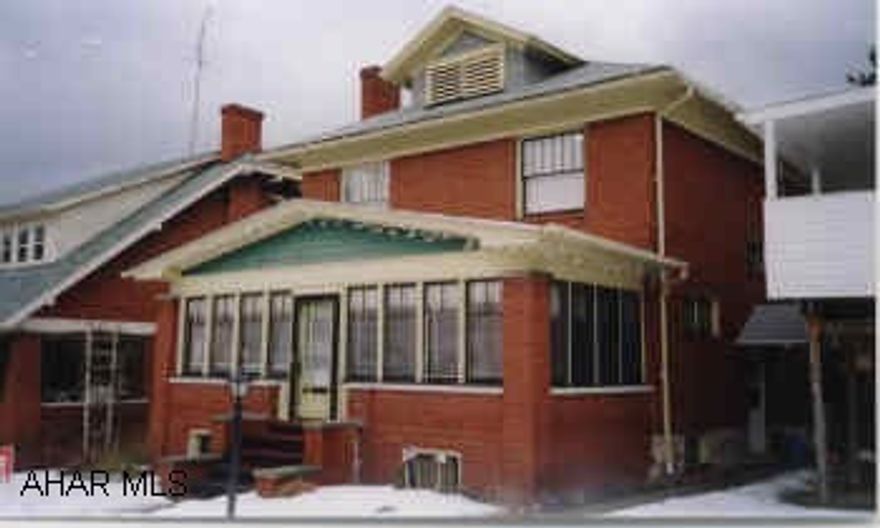 CHARMING 2 STORY BRICK WITH HARDWOOD FLOORS, FRENCH DOORS AND FIREPLACE.