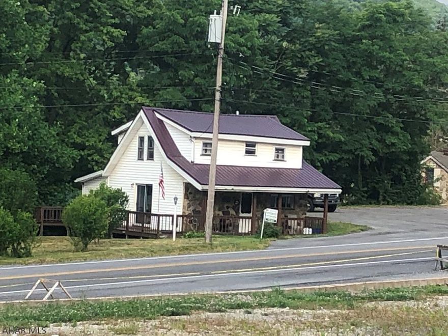 Super motivated Seller, if you have an interest in this property, Bring an Offer.  This is a commercial/Residential property.   The Parking Lot on the right side of the House goes with this sale.  New soffit and fascia put on house.  Home is generating an income, tenant is renting home. Call Realtor for details.