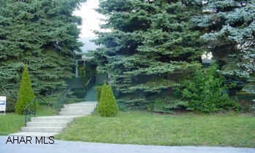 UNIQUE CAPE COD TUCKED AWAY ON ALMOST 1/2 ACRE.  STONE FIREPLACE IN LIVING ROOM, KITCHEN WITH ISLAND, FINISHED FAMILY ROOM IN BASEMENT, FINISHED ATTIC.  THREE CAR GARAGE AND ONE CAR GARAGE.  PRIVATE LOT.  DEAD END STREET.  RANGE, REFRIGERATOR,  DISHWASHER, WASHER, DRYER.