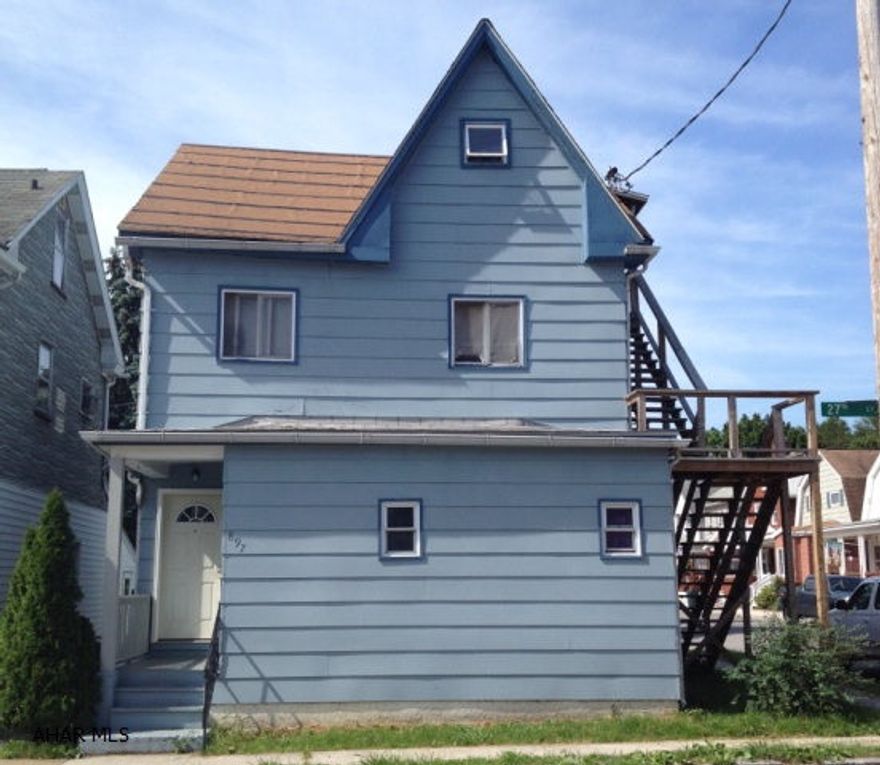 Fantastic investment opportunity in a nice area! Currently duplexed but has potential to be a triplex with turning the partially finished attic into an efficiency apartment to live in or rent out for additional income. Many updates includes newer furnace, freshly painted both units, newer kitchen floors & carpet in both units.