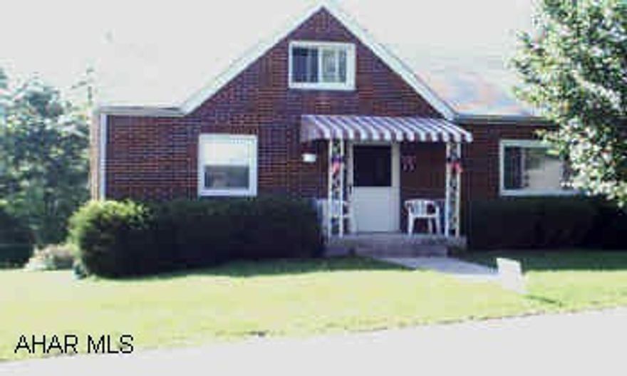 Brick Cape Cod with 4 or 5 bedrooms and 2 baths. Lovely home on large lot.  Move in without any work.