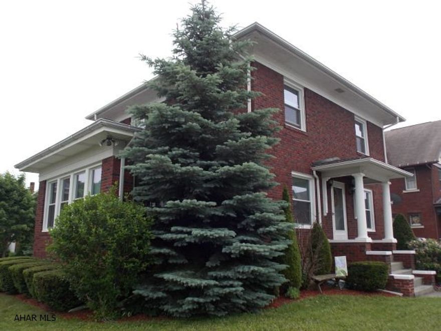 Charming brick 2 story with lovely woodwork, glass doorknobs, and french doors. New carpet, a gas fireplace, updated kitchen and bath make this a must see. All appliances are included so just bring your furniture and move in. The windows have been replaced which keeps the home nice and warm and the warranty transfers to the new owner. The home is spic and span, there is plenty of storage in the attic and basement, the yard is fenced in for pets and kids and the location is so convenient. This is a great starter home and a must see.