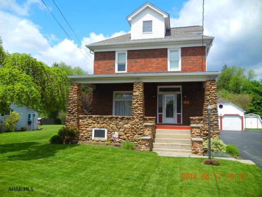 Immaculate 2.5 story brick home, kitchen, dining room, living room, hardwood floors. 3 bedrooms, 1.75 bath, newer roof, newer furnace, with hot water tank, replacement windows, 200 amp electric, great mechanics, shed, detached 2 stall garage. Finished attic could be 4th bedroom on a 55 x 312 lot. Newer paint very, very clean. Nothing to do but move in. Kitchen and bath totally updated. This property has a shared driveway.