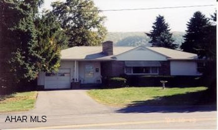 Lovely rancher with central air, one car attached garge, and one car detached garage with workshop. Great two bedroom ranch home with one car attached garge, one car detached garage with attached workshop. Full unfinished basement. Separate dining area.  Full unfinished basement
