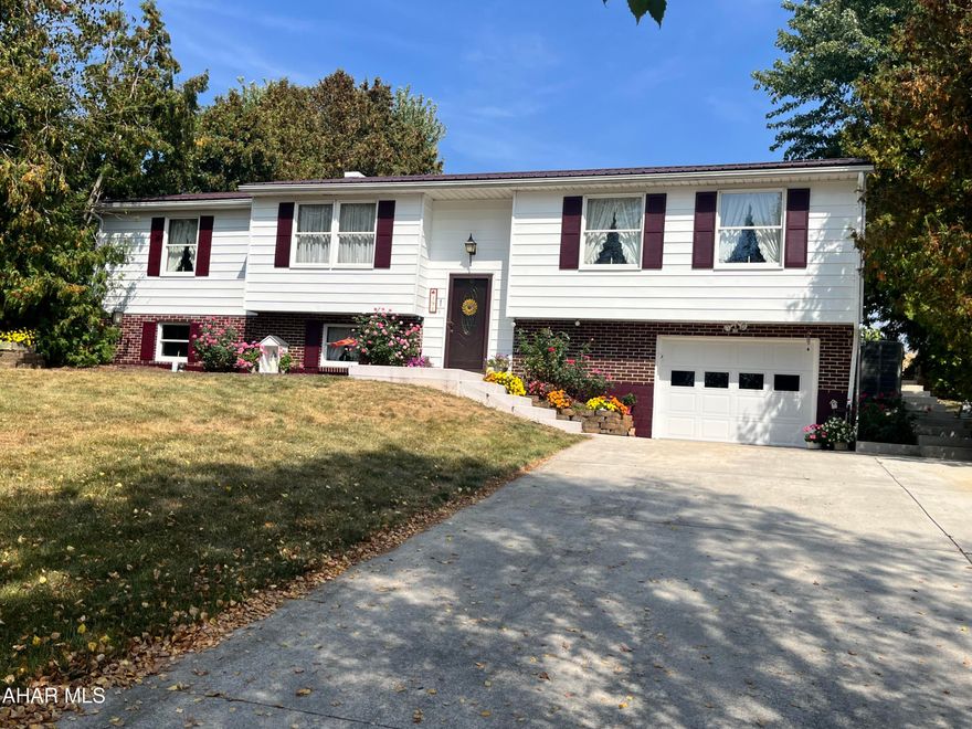 Don't miss your opportunity to be the new owner of this adorable home. This 1+acre property of country living on a quiet Cul-de-Sac in the quaint town of New Enterprise is a must see.  This fantastic home has room for everyone with 4 or 5 bedrooms, 2 full baths, several living/entertaining areas, tons of storage and a large maintenance free deck for outdoor entertaining. 2 sheds allow for ample storage of your outside play toys or for you to have a place to tinker with your woodshop hobbies.   In the summer you can collect fruit off of one of the many fruit trees, berry bushes or the grape arbor. This terrific home has been meticulously cared for, has low utility costs, and is move in ready. Schedule your showing today.