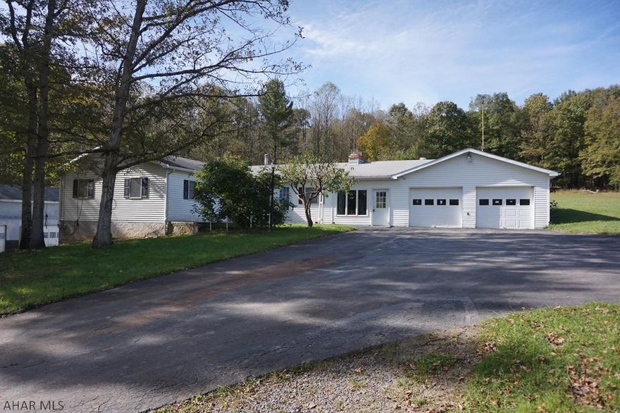 Great rural property off the beaten path! Very private, 3 BR, 2.5 BA ranch home w/large attached 2 car garage on 10.5 acres. Spacious LR. Combined kitchen & DR area. Bonus area off living room. Enjoy the enclosed breezeway w/wood stove between house and garage. LL with workshop/storage/ possible garage. Deck, detached pole garage building, pond. Large garden area, larger yard, woods & more. 2nd wooded parcel nearby of 10+ acres (466 Tartan Lane) This is an estate sale. Property being sold AS IS. Seller to make no repairs. All appliances and included items convey as is. Any inspections for informational purposes only. Seller (Executrix) is a Maryland licensed real estate agent. Need to access gate and have 4 wheel drive to reach Tartan Lane parcel. No sign at Tartan Lane ground.