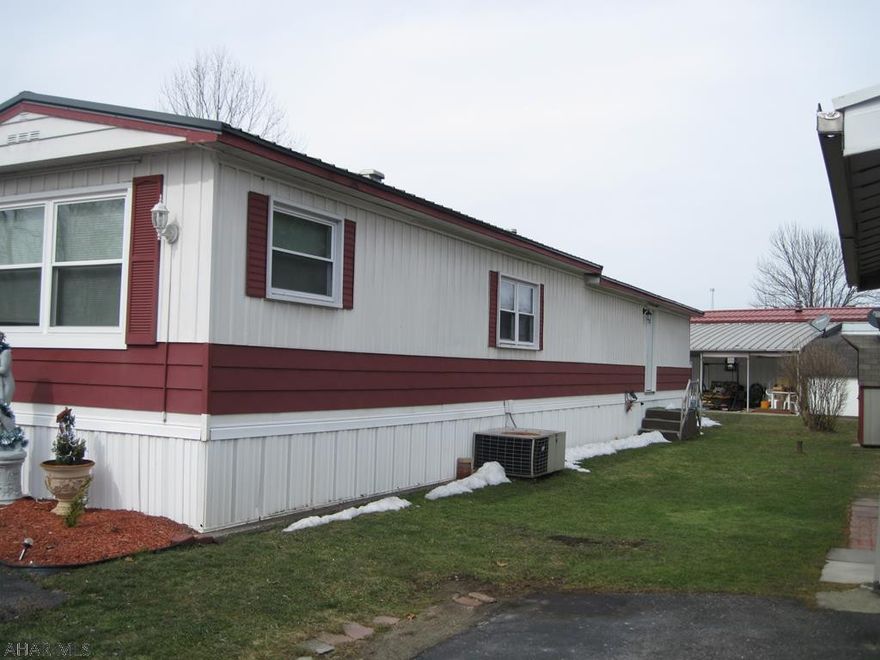 Renovated  A Few Months Ago This Mobile Home located In Eldorado Court 55 + Mobile Home Park Community in Altoona. Features, New Floors, New Sheetrock and Insulation Walls, New Kitchen Cabinets, Counters with Breakfast Bar with Overhead High Hat Lighting and New Flooring, New Stainless Steel Refrigerator and Stove, New Overhead Stainless Steel Microwave and Dishwasher. New Full Bath with Walk In Multi Shower, New Automated Window Treatments, New Interior and Exterior Paint, New Metal Roof, New Thermo Pane Windows and A New Broan Oil Burner Furnace. Also Pipes are wrapped with Insulation. Shed and Central Air as well. Parking for Two Cars. Tastefully Done and Ready for the New Owner To Reside in this Nice Quiet Community. Go on CentralPAHomefinders and click on the Camcorder Icon to View.