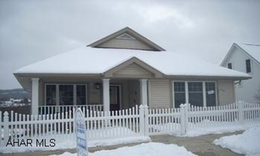 Deck off family room w/ Sunbrella awning.pergo floors and carpeting. Deck also off Dining area.