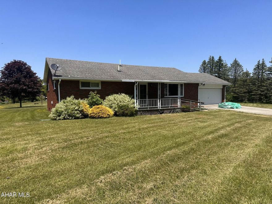 Ebensburg-  Cambria Township- 3 BR, 2 1/2 bath brick ranch home on 4.7 level acres.  Finished basement with propane fireplace, kitchen, and 3/4 bath.  Propane, forced air heat.  2 car attached garage along with a detached garage & loft area.