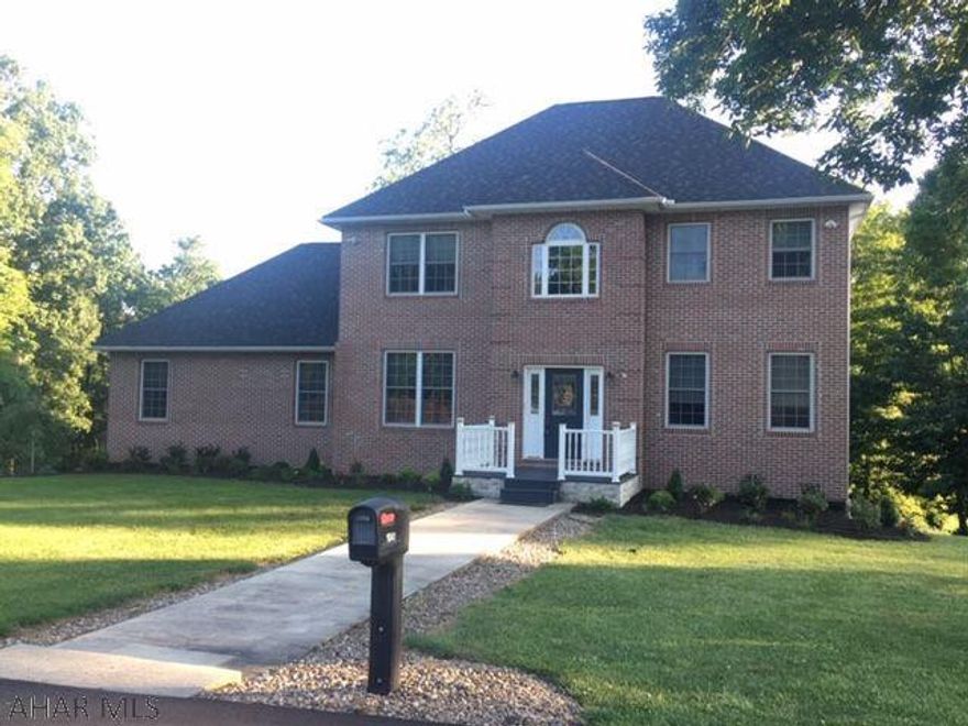 Stunning, high-end home situated in desirable Juniata Mills Development. Newly remodeled first floor including custom built kitchen w/ oak cabinets featuring soft close, slide outs & granite countertops. Finished beautifully w/ farmhouse sink. Newer stainless steel appliances. First floor has new flooring throughout of easy care wood-look ceramic planks. Laundry on first floor. 2nd floor has spacious master bedroom with ensuite bath & large walk in closet. 2 more bedrooms & full bath complete the 2nd floor. Basement has been remodeled w/ large family room, exercise space, 3/4 bath & kitchenette, could easily be an in-law suite. Basement has large closets for storage & a nice walk out to covered patio. New deck on back with steps from first floor to basement level. Harman pellet stove.