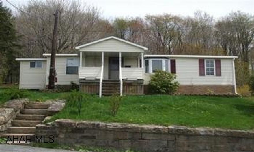 Double wide with addition, including 2 car att'd garage. Seller is listing agent's cousin.