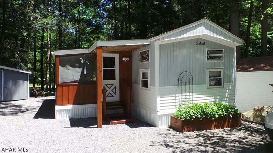 Nice Mallard Park single wide w/ screened porch, 3 bedrooms and shed in nice wooded area. Assoc. fees 438 per year include community pool, tennis courts, road maintenance and trash. Great for a weekend getaway.