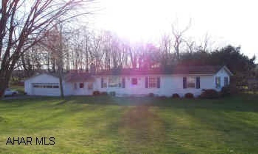 3 bedroom home on 1 acre New windows, new bath, nice level yard.