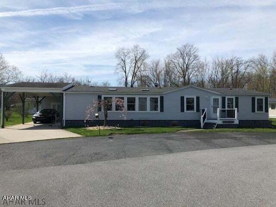 Well maintained 3 Bedroom 2 Full Bath with Newer Windows and Newer Roof, Nice Enclosed Sunroom, Large Family Room with Fireplace and newer floorings, storage shed and large carport.  Very quiet 55+ Community. New buyers lot rent will be $625/month and that covers trash and snow removal.  This is a must see!!!