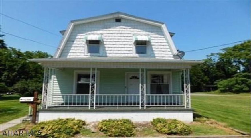 Lots of potential! Large flat lot would make a great area for an outdoor living area. Best features include a detached garage, shed/playhouse, 2 bedrooms, 1 bath, and dining room. Some TLC could make this a great home