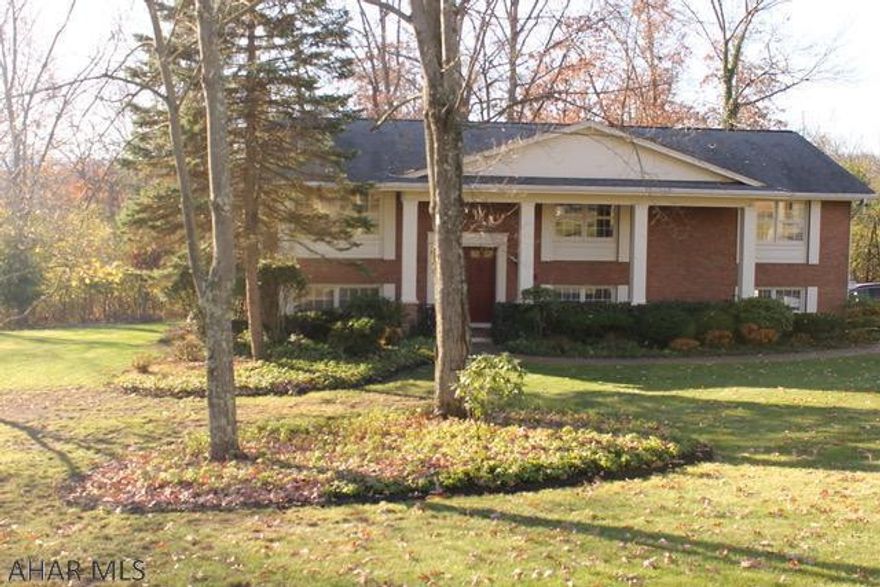 Don't let this well maintained, move in ready home get away!!  This 3 bedroom 2 bath home in Hollidaysburg is situated on 1/2 acre.  As you enter the home the steps will lead you to the bright living room and dining room area.  The sliding door in the dining room opens to a private balcony.  Newly remodeled spacious kitchen including all appliances, large full bath and three bedrooms complete the main level.  Lower level offers a large family room with wood fireplace, full bath, laundry room, bonus room can be a craft area or extra storage and nice size 2 car integral garage. Call today to schedule this easy to show home!