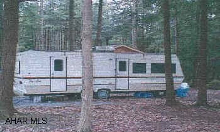 32 ft Hyline travel trailer. Located in Glendale Yearound, gated community.