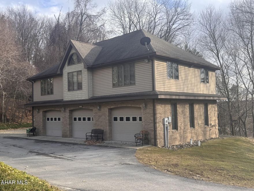 Northern Cambria:  Immaculate 3 BR 2 bath brick home on over a half acre landscaped lot.  Eat-in kitchen.  Oil, hot water heat.  3 car integral garage with plenty of space to work.  200-amp electric service.  Just bring your furniture.