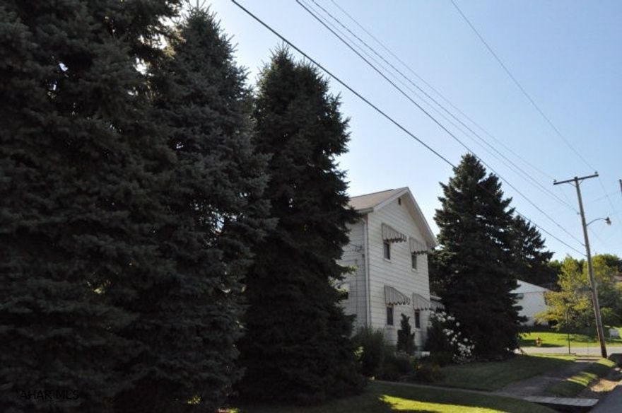 VERY NICE 2 STORY LOCATED IN PLEASANT VALLEY FEATURES 3 BEDROOMS ,FINISHED BASEMENT CURRENTLY USED AS A 4TH BEDROOM COULD BE A FAMILY ROOM.THERE IS A 3/4 BATH IN THE BASEMENT,A CLOSED IN SUN PORCH2 CAR GARAGE WITH WORKSHOP.