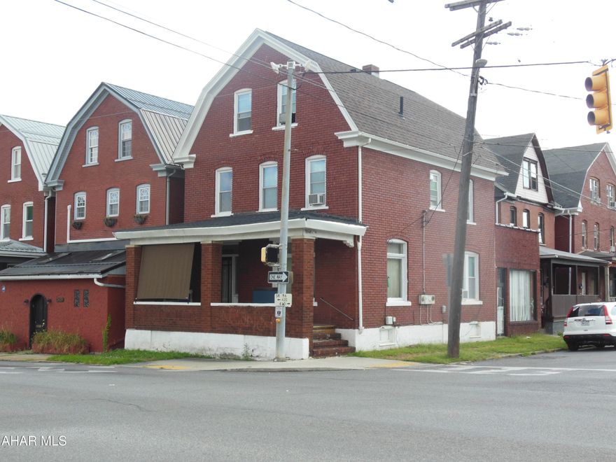 Solid, large brick 2.5 story at the corner of 7th and Union Ave's  New roof, flooring, updated/newer half bath, attached room used as an office.  Was duplexed in the past. ~6 BR, 2.5 BA, good mechanics. Gas fireplace hasn't been used by the current owners.  Call for appointment - allow 1 hr notice for showings..
Ready for a large family..