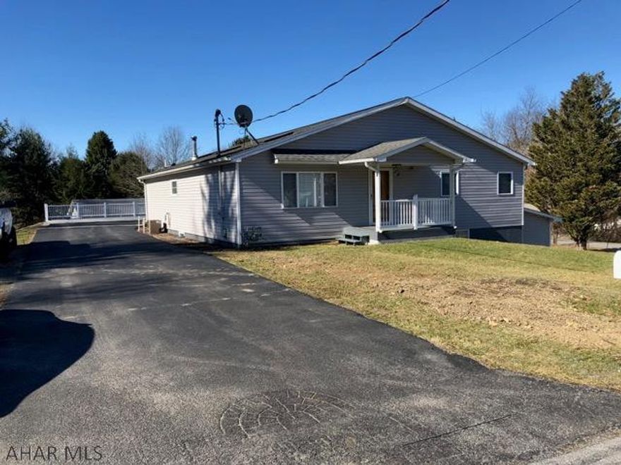 WOW!!  This home offers a brand new open floor plan kitchen w/Quartz and SS appliances and large walk in pantry.  Huge rooms and beautiful new bathrooms.  And the family room is big enough for the family reunion!!  A large drive in utility garage under the house makes it convenient for mower storage.  The patio is as oversized as the rooms for all of your outdoor entertaining.  Oh and don't forget the parking pad for the RV.  This is a must see before its gone!