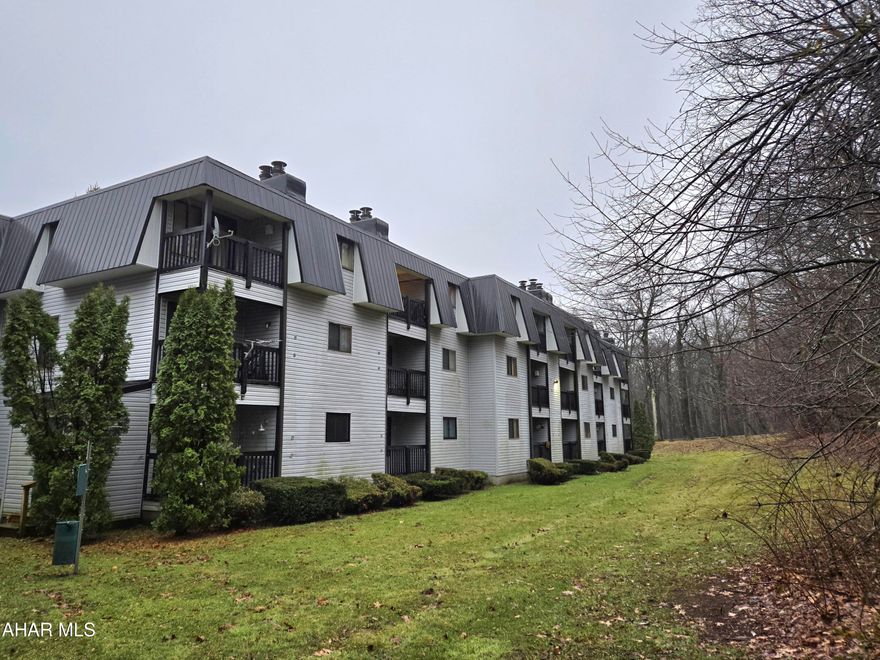 1327 Deer Run. 2-bedroom 2-bath Blue Knob condo with stone front fireplace, full updated counter bar w/stools, knotty pine wall, fully furnished w/newer furniture. Enjoy the comfort of this well maintained condo + skiing, swimming, golf and tennis at this 4-season Blue Knob resort. Nice wooded view from back balcony. Located across from indoor hottub. J-660